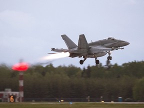 An RCAF CF-18 takes off from CFB Bagotville, Que. on Thursday, June 7, 2018.