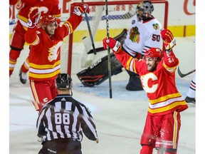 Calgary Flames Michael Frolik celebrates after scoring against the Chicago Blackhawks in NHL hockey at the Scotiabank Saddledome in Calgary on Saturday. Photo by Al Charest/Postmedia