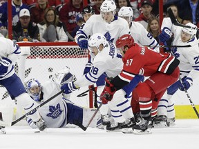 Carolina Hurricanes' Trevor van Riemsdyk (57) scores on Maple Leafs goalie Frederik Andersen on Wednesday night in Raleigh, N.C. (Gerry Broome/The Associated Press)