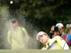 Ariya Jutanugarn of Thailand hits out from a bunker on the 18th green during the first round of the TOTO Japan Classic at Seta Golf Course on Nov. 2, 2018 in Otsu, Shiga, Japan.