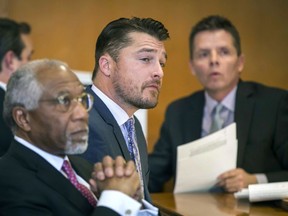 FILE - In this Nov. 27, 2017, file photo, Iowa farmer and former TV reality show celebrity Chris Soules, center, listens during a hearing in court in Independence, Iowa. Soules has pleaded guilty in a fatal crash last year near his home in northern Iowa. In an agreement with prosecutors announced Tuesday, Nov. 13, 2018, Soules pleaded guilty to a reduced charge of leaving the scene of a serious injury accident.