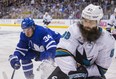 Maple Leafs’ Auston Matthews (left) puts on the brakes as he closes in on San Jose Sharks’ Brent Burns during Wednesday night’s game at Scotiabank Arena. (Ernest Doroszuk/Toronto Sun)