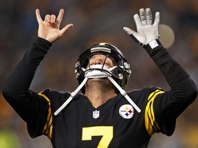 Steelers quarterback Ben Roethlisberger celebrates a touchdown pass to Antonio Brown during first half NFL action against the Panthers in Pittsburgh, Thursday, Nov. 8, 2018.
