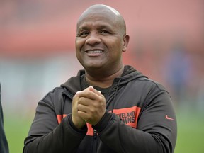 FILE - In this Sunday, Oct. 7, 2018 file photo, Cleveland Browns head coach Hue Jackson watches before an NFL football game between the Cleveland Browns and the Baltimore Ravens in Cleveland. A person familiar with the hiring says former Browns coach Hue Jackson is re-joining Cincinnati's staff under Marvin Lewis. Jackson, who was fired in Cleveland on Oct. 19, will join the Bengals in a still to be determined role, said the person who spoke to The Associated Press on condition of anonymity because the team has not made the hiring official.