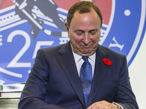 Gary Bettman check out his Hockey Hall of Fame ring on Friday. (Ernest Doroszuk/Toronto Sun)