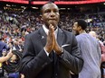 Former Toronto Raptors coach and current coach Detroit Pistons Dwane Casey arrives on court in Toronto on Wednesday.