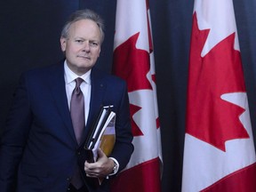 Stephen Poloz, Governor of the Bank of Canada, holds a press conference at the National Press Theatre in Ottawa on Wednesday, Oct. 24, 2018. The governor of the Bank of Canada says after a decade of low-interest rates around the world the global economy has reached stronger footing where stimulus can be steadily withdrawn.