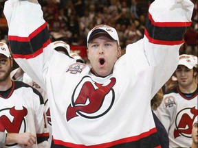 Former New Jersey Devils goaltender Martin Brodeur was great in goal, but, “he could be the third defenceman on the ice,” according to Leafs great Wendel Clark. (The Canadian Press)