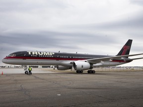 In this March 1, 2016 file photo, Republican presidential candidate Donald Trump's private jet arrives at Port-Columbus International Airport, in Columbus, Ohio. (AP Photo/John Minchillo, File)