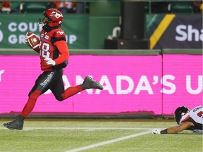 The Calgary Stampeders' Terry Williams runs in the ball for a touch down during the first half of the 106th Grey Cup at Commonwealth Stadium in Edmonton on Sunday Nov. 25, 2018.