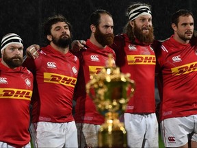 The Webb Ellis Cup stands in front of the Canadian team ahead of the 2019 Japan Rugby Union World Cup qualifying match between Hong Kong and Canada at The Delort Stadium in Marseille, France on Friday, Nov. 23, 2018.