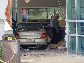 A car has crashed into a Social Security office, Tuesday, Nov. 13, 2018 in Egg Harbor, N.J.