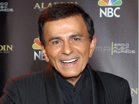 FILE - In this Oct. 27, 2003 file photo, Casey Kasem poses for photographers after receiving the Radio Icon award during The 2003 Radio Music Awards at the Aladdin Resort and Casino in Las Vegas. A judge in Washington state has granted Kasem's daughter a temporary restraining order preventing the famous radio host's wife from cremating or removing his remains from a funeral home. Kasem, the radio host of "American Top 40" and voice of animated television characters like Scooby-Doo's sidekick Shaggy, died June 15, 2014, at a hospital in Gig Harbor, Wash.