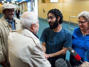 Hassan Al Kontar meets supporters after arriving in Vancouver after flying from Kuala Lumpur in Vancouver on Monday, Nov. 26, 2018.