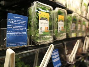 In this Nov. 20, 2018, file photo Romaine lettuce is removed from the shelves of the East End Food Co-op and other local grocery stores due to a recent consumer alert regarding a multi-state E.Coli outbreak in Pittsburgh.