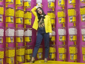 Instagram influencer Negin Tavana, whose page @Negzila has more than 35,000 followers, is pictured at the pop art installation "Happy Place" in Toronto, on Monday, October 29, 2018.