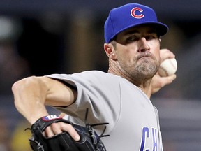 In this Aug. 17, 2018, file photo, Chicago Cubs starter Cole Hamels pitches to a Pittsburgh Pirates batter in Pittsburgh. (AP Photo/Keith Srakocic, File)