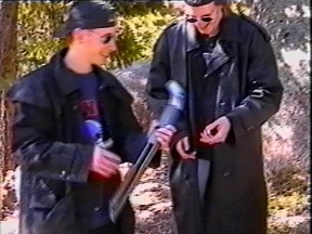 Eric Harris (left) and Dylan Klebold examine a sawed-off shotgun at a makeshift shooting range March 6, 1999 in Douglas County, CO in this image from video released by the Jefferson County Sheriff's Department. (Photo by Jefferson County Sheriff's Department via Getty Images)