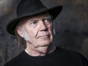 In this May 18, 2016, file photo, Neil Young poses for a portrait in Calabasas, Calif. Young has confirmed he's most definitely married to Daryl Hannah.