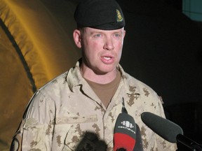 Lt.-Col. Craig Dalton, chief of staff for Task Force Kandahar, tells reporters that Canada has given command of Kandahar city to the U.S., Thursday, July 15, 2010 in Kandahar.