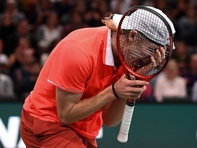 Denis Shapovalov reacts during his match against Richard Gasquet at the Rolex Paris Masters at The AccorHotels Arena in Paris, on October 29, 2018. (ANNE-CHRISTINE POUJOULAT/AFP/Getty Images)