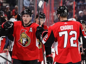 Matt Duchene of the Ottawa Senators celebrates his third period power-play goal against the Edmonton Oilers with teammate Thomas Chabot at Canadian Tire Centre on March 22, 2018 in Ottawa.