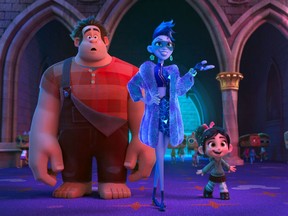 This image released by Disney shows characters, from left, Ralph, voiced by John C. Reilly, Yess, voiced by Taraji P. Henson and Vanellope von Schweetz, voiced by Sarah Silverman in a scene from "Ralph Breaks the Internet."