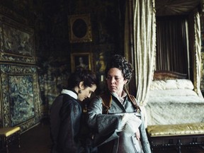 This image released by Fox Searchlight Films shows Rachel Weisz and Olivia Coleman, right, in a scene from the film "The Favourite."  (Yorgos Lanthimos/Fox Searchlight Films via AP)