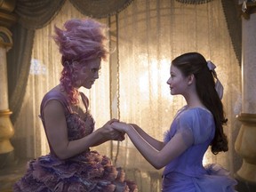 This image released by Disney shows Keira Knightley, left, and Mackenzie Foy in a scene from "The Nutcracker and the Four Realms."