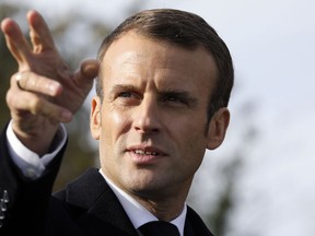 French President Emmanuel Macron arrives at the Trottoir necropolis in Les Eparges, eastern France, Tuesday Nov. 6, 2018, as part of the ceremonies marking the centenary of the end of First World War.