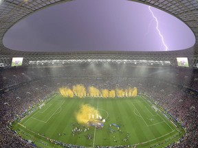 Lightning strikes as France players celebrate after the Russia 2018 World Cup final football match between France and Croatia at the Luzhniki Stadium in Moscow on July 15, 2018.