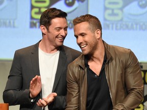 Hugh Jackman (L) and Ryan Reynolds appear onstage at the 20th Century FOX panel during Comic-Con International 2015 at the San Diego Convention Center on July 11, 2015 in San Diego, California.