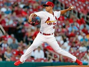 In this June 13, 2017, file photo, then-St. Louis Cardinals starting pitcher Marco Gonzales throws during the first inning in the second game of a baseball doubleheader against the Milwaukee Brewers, in St. Louis.