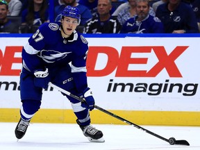 Yanni Gourde of the Tampa Bay Lightning looks to pass during a game against the Columbus Blue Jackets at Amalie Arena on October 16, 2018 in Tampa. (Mike Ehrmann/Getty Images)