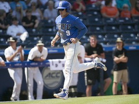 Duke's Griffin Conine scores against Wake Forest in the Atlantic Coast Conference tournament, Thursday, May 24, 2018, at Durham Bulls Athletic Park in Durham, N.C. (Robert Willett/The News & Observer via AP)