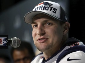 In this Feb. 4, 2018, file photo, New England Patriots tight end Rob Gronkowski answers questions during a news conference ahead of the Super Bowl, in Minneapolis.