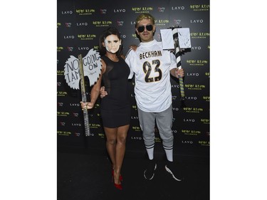 Singer and television personality Mel B and boyfriend Gary Madatyan attend Heidi Klum's 19th annual Halloween party at Lavo New York on Wednesday, Oct. 31, 2018, in New York. (Evan Agostini/Invision/AP)