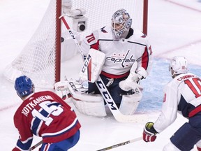 Canadiens' Jesperi Kotkaniemi fires his first NHL goal past Capitals goalie Braden Holtby Thursday night at the Bell Centre.