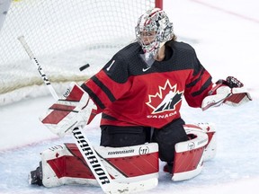 Canada goaltender Shannon Szabados looks back as a shot from the United States goes off the post during the first period of 2018 Four Nations Cup preliminary game in Saskatoon on Wednesday, November 7, 2018.