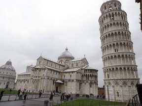 The Leaning Tower of Pisa (Torre di Pisa) is seen at right next to the medieval cathedral of Pisa, in Piazza dei Miracoli Square, in Pisa, Italy, Sunday, Jan. 2, 2012. On Thursday, Nov. 22, 2018, after more than two decades of efforts to straighten it, engineers say the famed Tuscan bell tower has recovered four centimeters (1.57 inches) and is in better structural health than predicted.