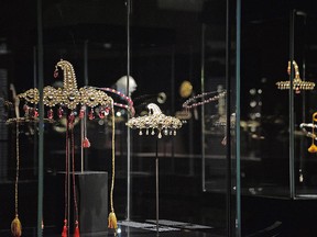 In this Wednesday, Jan. 3, 2018 file photo, some jewels from the famed Al Thani Collection are on display at the 'Treasures of the Mughals and the Maharajahs' exhibition, at Venice's Doge's Palace, in Venice, Italy. (Andrea Merola/ANSA via AP, file)