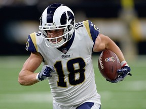 In this Nov. 4, 2018, file photo, Los Angeles Rams wide receiver Cooper Kupp carries for a touchdown in the second half of an NFL game against the New Orleans Saints, in New Orleans.