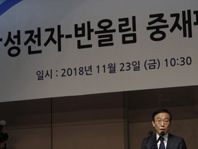 Kinam Kim, President & CEO, Device Solutions, Samsung Electronics apologizes in Seoul, South Korea, Friday, Nov. 23, 2018. Samsung Electronics has apologized for the sickness and deaths of some of its workers, saying it failed to create a safe working environment at its computer chip and display factories.