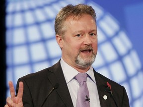 In this file photo dated Tuesday, Nov. 1, 2011, Richard Allan, Facebook's Director of Policy for Europe, gestures as he speaks at the London Cyberspace Conference in London.