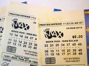 A lotto Max ticket is shown in Toronto on Monday Feb. 26, 2018.