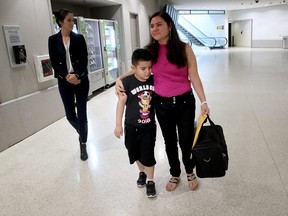 Seven-year-old Andy is reunited with his mother, Arely, at Baltimore-Washington International Airport July 23, 2018 in Linthicum, Maryland.