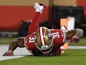 Raheem Mostert of the San Francisco 49ers celebrates after a touchdown against the Oakland Raiders during their NFL game at Levi's Stadium on Nov. 1, 2018 in Santa Clara, Calif.