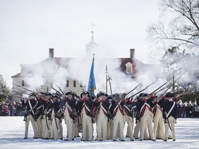 Members of the U.S. Army 3rd Infantry Regiment (The Old Guard) fire their weapons during a military exercise exhibition for visitors at George Washington's Mount Vernon Estate, February 17, 2014 in Mount Vernon, Virginia. (Drew Angerer/Getty Images)