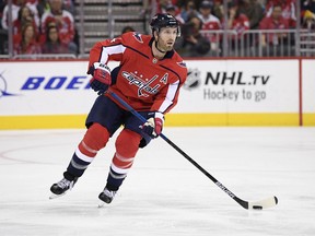 In this Oct. 19, 2018, file photo, Washington Capitals defenceman Brooks Orpik skates with the puck against the Florida Panthers, in Washington.