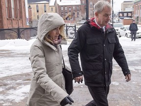 Dennis Oland and his wife Lisa arrive at the Law Courts in Saint John, N.B. on Tuesday, Nov. 20, 2018. His trial in the bludgeoning death of his millionaire father, Richard Oland continues after a two-week hiatus. The verdict from Oland's 2015 murder trial was set aside on appeal in 2016 and a new trial ordered. Richard Oland, 69, was found dead in his Saint John office on July 7, 2011.